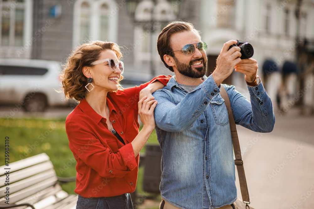 Fototapeta premium man and woman on romantic vacation walking together