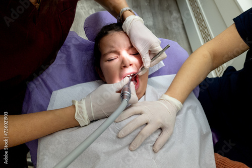 Little girl goes to the dentist for dental health