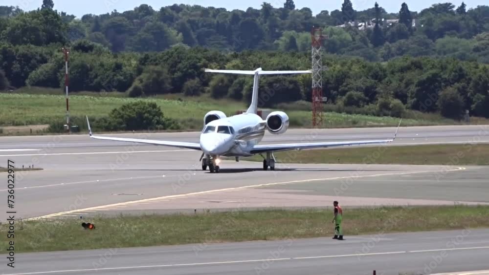 Generic Airplane Turning and Taxiing on the tarmac of airport unmarked white Generic Airplane Turning and Taxiing on the tarmac of airport unmarked white