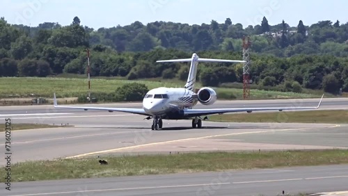 Generic Business Jet Taxiing and Turning Head On after Landing at Executive photo