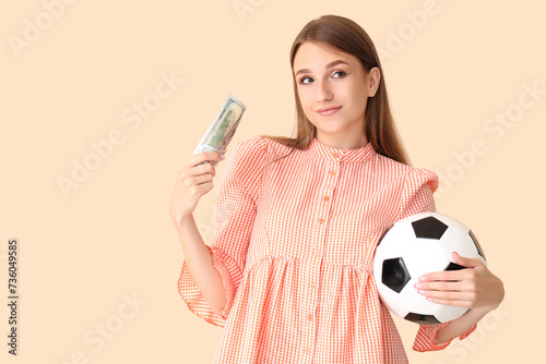 Young woman with soccer bal...