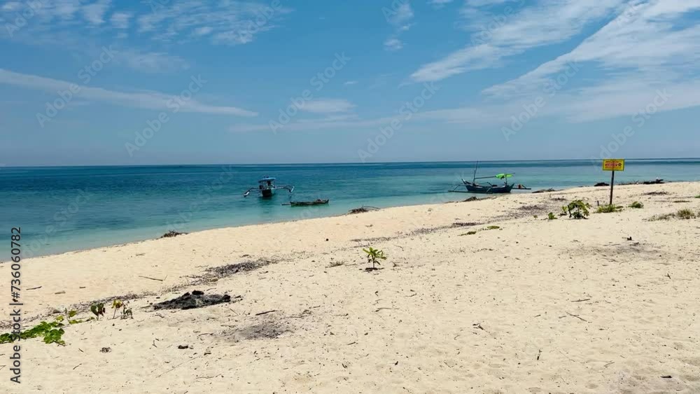 The beauty of the blue sea on Tabuhan Island in the Bali Strait, Indonesia. The beauty of the blue sea on Tabuhan Island in the Bali Strait, Indonesia.