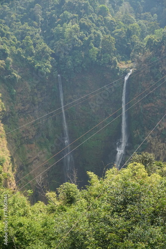 A beautiful waterfall in the midst of perfect nature in the forest.