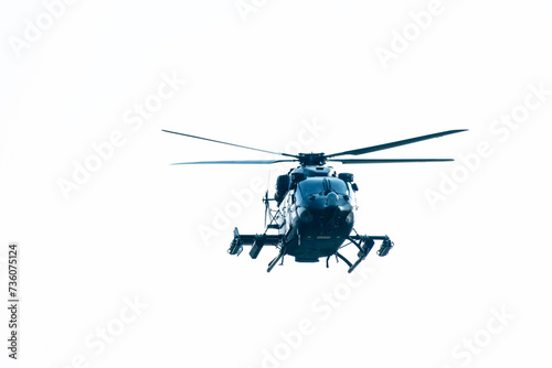 Fototapeta Naklejka Na Ścianę i Meble -  Close-up of helicopter flying on isolated white background