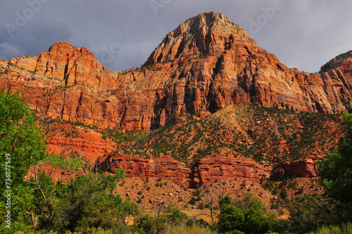 Sandstone peaks towering above the valley on the approach to the Narrows of the Virgin river  Zion National Park  Utah  Southwest USA.