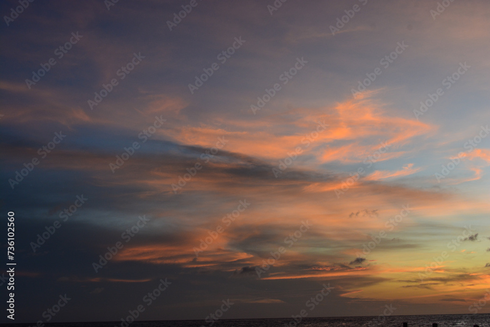 Scenic view of colourful sky during sun setting in Caribbean sea.