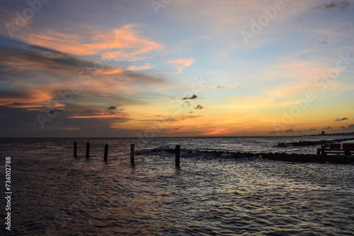 Scenic view of sun setting and bright horizon in Caribbean sea. © Lara Red