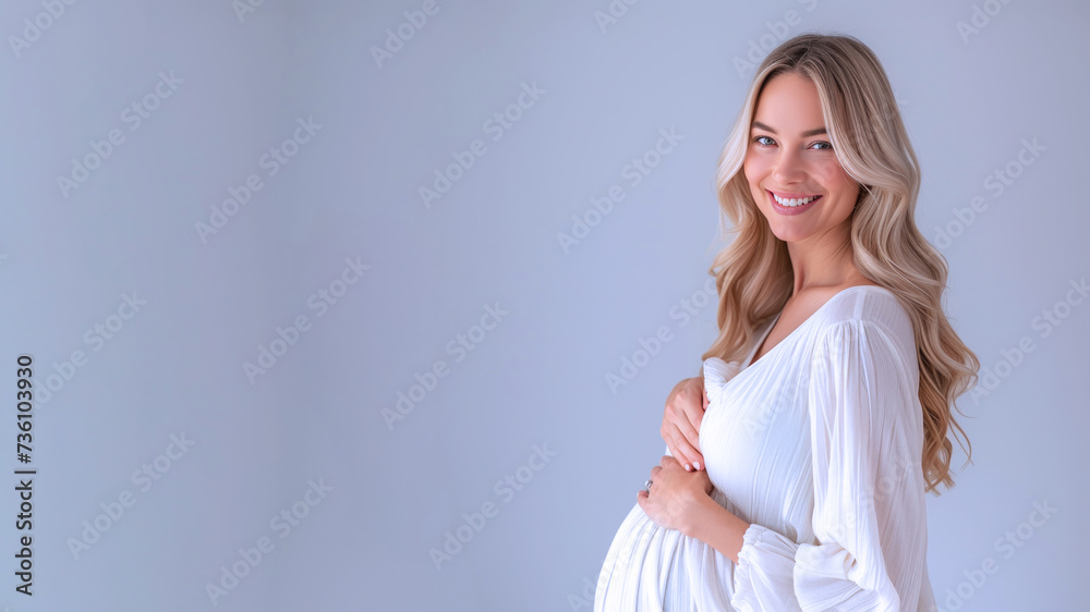 Blonde pregnant woman with pregnancy belly, in soft white clothes Blonde pregnant woman with pregnancy belly, in soft white clothes