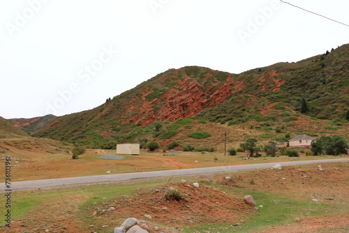 Unusual rock formations from red sandstone in canyon Seven bulls in Jeti-Oguz, Kyrgyzstan photo