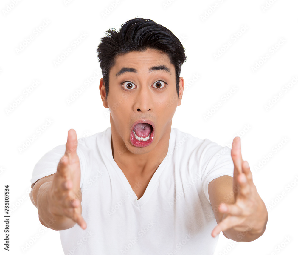 portrait of a wild, goofy, crazy, funny, shocked surprised stunned young man with wide open mouth and eyes, isolated on white background. portrait of a wild, goofy, crazy, funny, shocked surprised stunned young man with wide open mouth and eyes, isolated on white background.