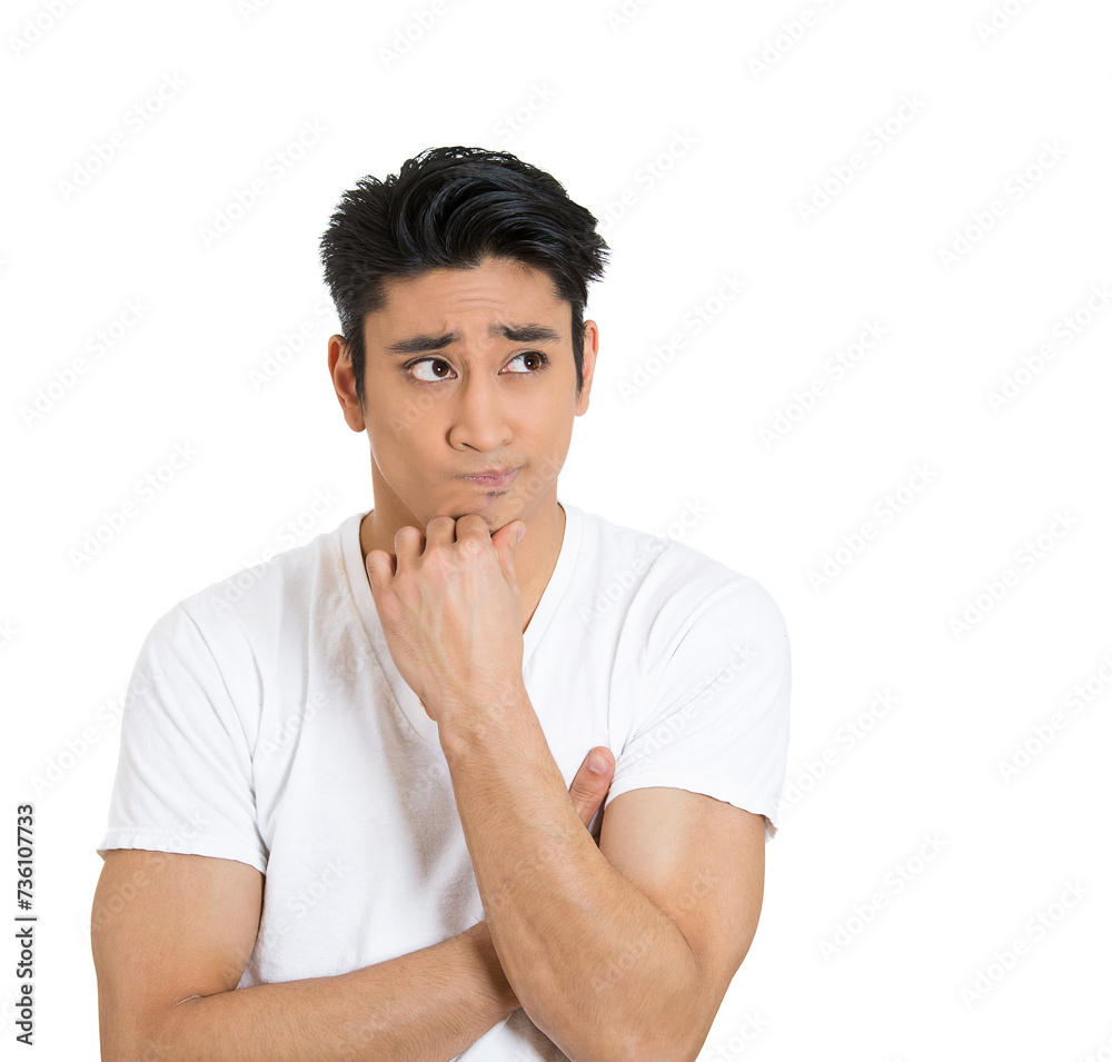 Portrait of a funny confused skeptical man thinking looking to the side isolated on white background Portrait of a funny confused skeptical man thinking looking to the side isolated on white background
