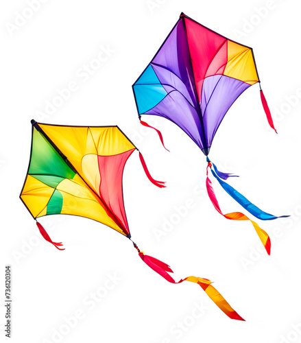 Two colorful kites flying with waving ribbons, isolated on white