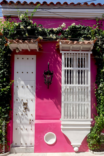 Beautiful fuchsia facade in the Historic Center of the city. of Cartagena, Colombia.