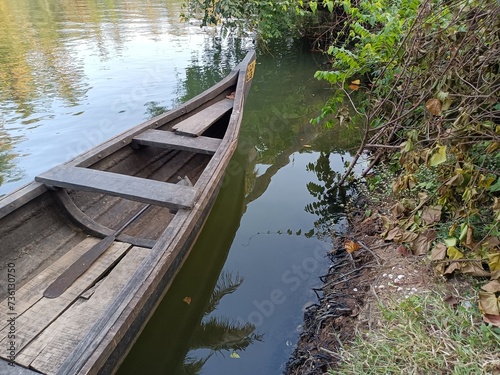 A wooden vehicle used for water transport is usually called a canoe. 