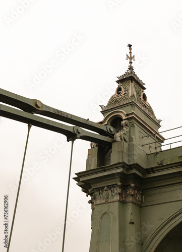 Design Architecture of Hammersmith Bridge. One of the world's oldest suspension bridges and a major river crossing and primary route in west london, Space for text, Selective focus. photo