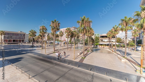 Panorama showing aerial view of the fountains and palms on the main square Sheshi Liria in Durres timelapse, Albania © neiezhmakov