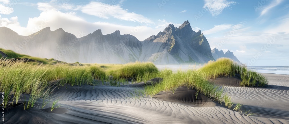 Sand dunes on the Stokksnes on southeastern Icelandic coast with Vestrahorn (Batman Mountain). Iceland, Europe - obrazy, fototapety, plakaty 