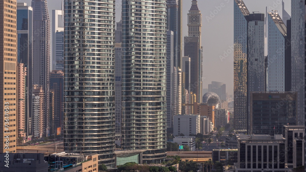Fototapeta premium Dubai International Financial district aerial timelapse during sunrise
