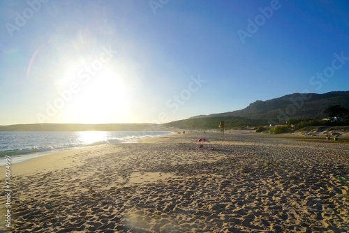 beautiful beach Playa de Bolonia at the Costa de la Luz during the sunset, Andalusia, Cadiz, Spain photo