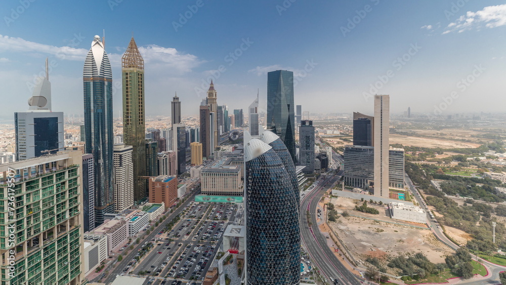 Pamorama showing skyline view of the high-rise buildings on Sheikh Zayed Road in Dubai aerial timelapse, UAE.