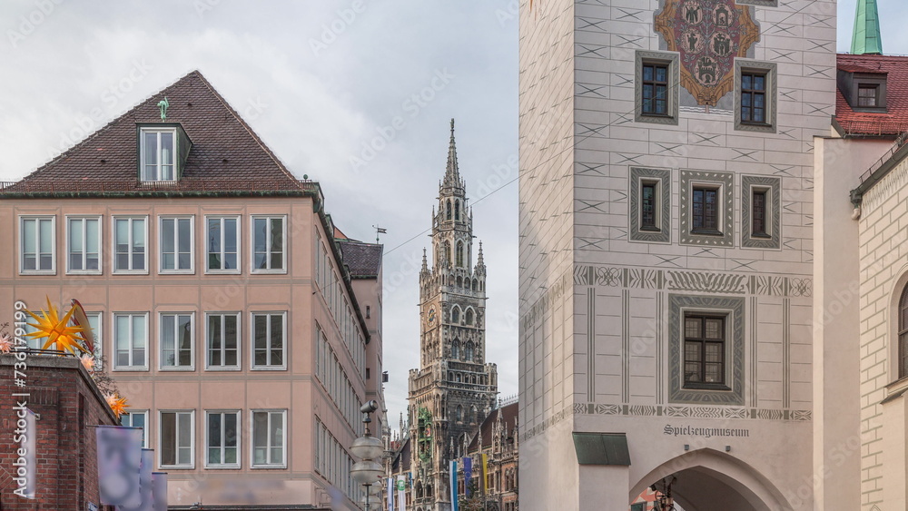 Marienplatz with the old Munich town hall, Rathaus-Glockenspiel and the Talburg Gate timelapse, Bavaria, Germany.