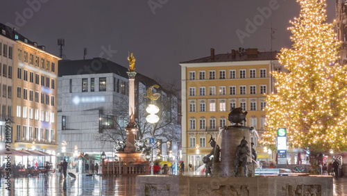 Fish Fountain, Fischbrunnen in front of the New New Town Hall at Marienplatz night timelapse in Munich, Germany