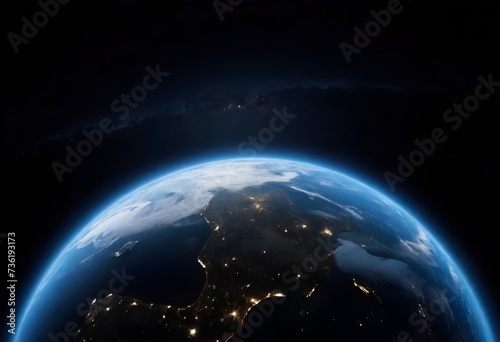 A view of Earth from space showing part of the planet with a mix of daylight and city lights at night, against a starry background