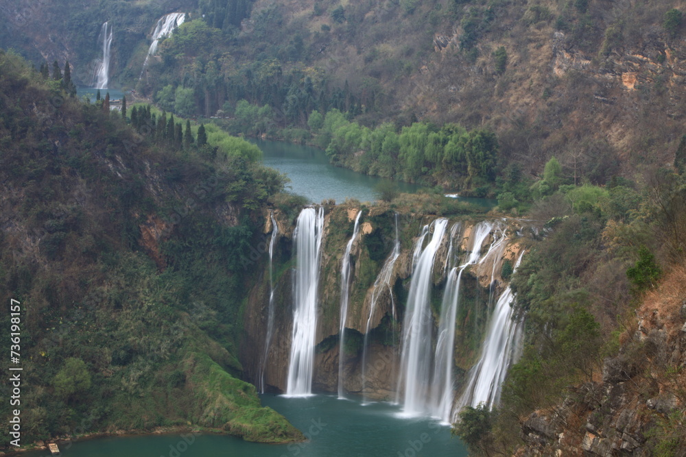 The Nine Dragons Waterfall or Jiulong waterfall is located on Juilong river in Louping country. One of China 's top five beautiful waterfall group. The Nine Dragons Waterfall or Jiulong waterfall is located on Juilong river in Louping country. One of China 's top five beautiful waterfall group.