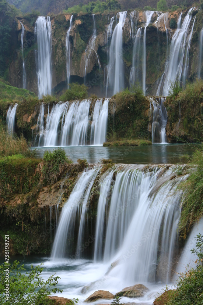 The Nine Dragons Waterfall or Jiulong waterfall is located on Juilong river in Louping country. One of China 's top five beautiful waterfall group.