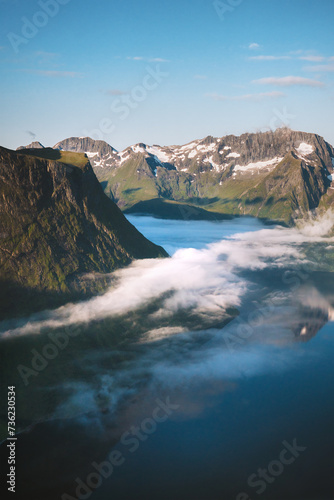 Hjorundfjord landscape in Norway mountains aerial clouds view travel Sunnmore Alps beautiful destinations scenery scandinavian nature