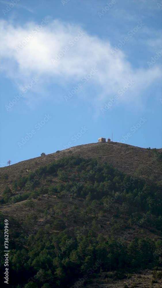 Slow motion, panoramic view to the peak of Penyagolosa mountain on a winter morning. Comunidad Valenciana, Spain Slow motion, panoramic view to the peak of Penyagolosa mountain on a winter morning. Comunidad Valenciana, Spain