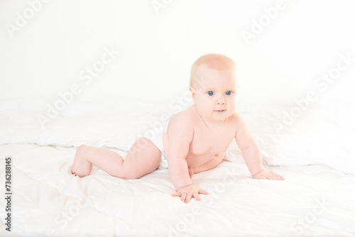 portrait of a cute baby in a diaper