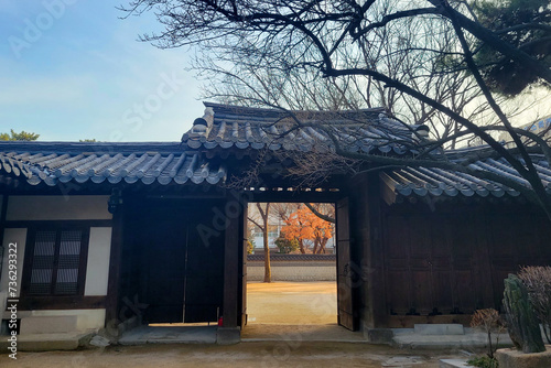 Fototapeta Naklejka Na Ścianę i Meble -  Hanok, Bukchon Hanok Village, alley, landscape, pine tree, ancient ambience, Korean traditional houses, Korean roof tile, palace