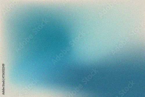 Vector abstract grainy texture gradient background in blue color photo