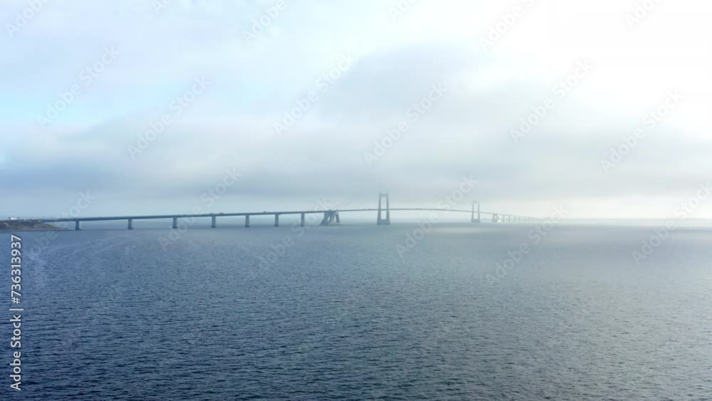 Captivating Drone Retreat From The Great Belt Bridge Captivating Drone Retreat From The Great Belt Bridge