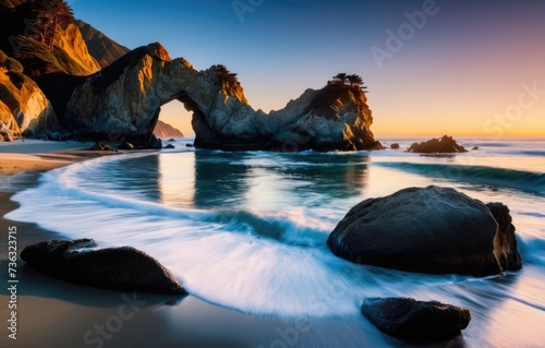 at the sunset's golden glow framing a natural rock arch on Pfeiffer Beach by ai generated photo