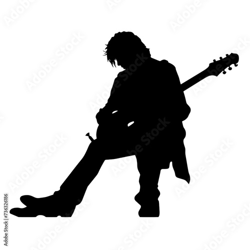 silhouette of a person with a guitar