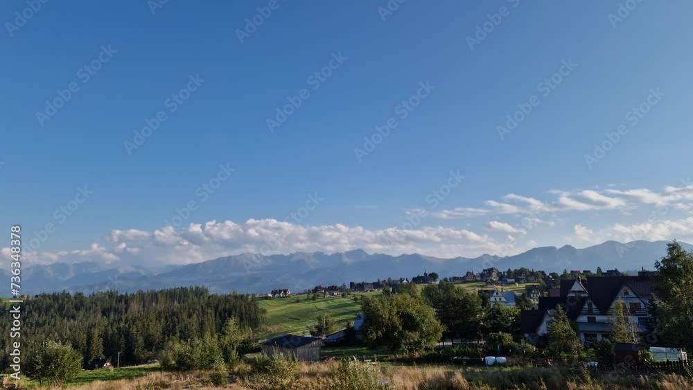 Time lapse. cloudscape view of the Tatras and Beskids with a mountain village. Poland Time lapse. cloudscape view of the Tatras and Beskids with a mountain village. Poland