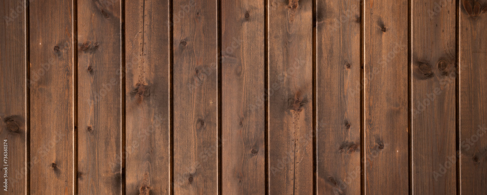 Naklejka premium Dark brown wood background material.