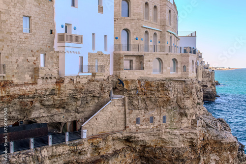 Fotografie view of the walls of the city of Polignano a Mare, located on a slope on the Adr