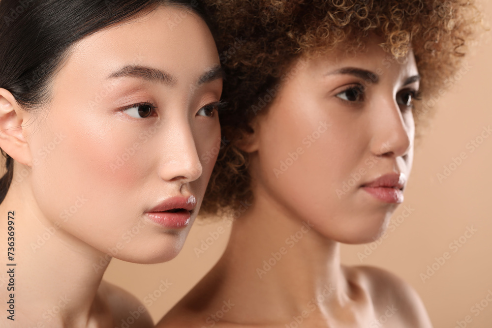 Beautiful young women with healthy skin on beige background Beautiful young women with healthy skin on beige background