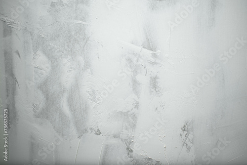 Imagen horizontal de una pared con textura color blanco y gris ideal para fondos 