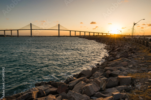 Rocks of the Pier and Newton Navarro Bridge in Natal City on Sunset © Donatas Dabravolskas