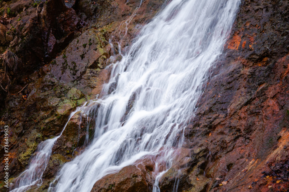 Scenic waterfall in slow motion flow Scenic waterfall in slow motion flow