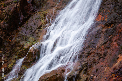 Scenic waterfall in slow motion flow