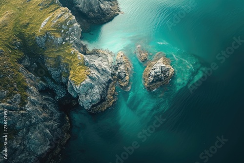 This aerial photo captures a view of a body of water surrounded by rugged rocks, Bird's eye perspective of a tranquil sea cradling a rocky isle, AI Generated photo