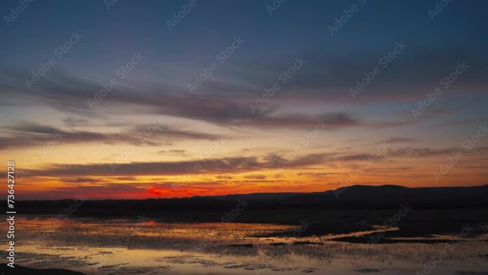 Sunrise sky and cloudy Beautiful nature. Reflection of clouds in water of pond. Dusk sky over hills at Kutch, India. Nature tranquil landscape. Sunrise sky and cloudy Beautiful nature. Reflection of clouds in water of pond. Dusk sky over hills at Kutch, India. Nature tranquil landscape.