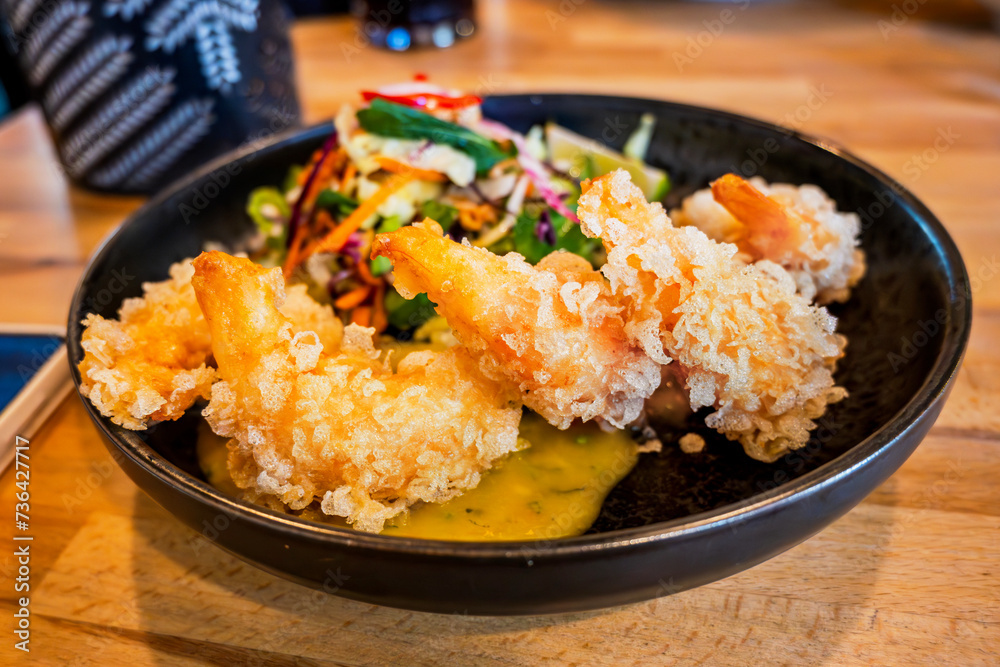 Fried tempura shrimp with salad. Fried tempura shrimp with salad.