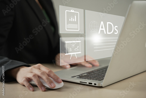Digital marketing commerce online sale concept, Businessman use laptop with advertising on website. planning advertising marketing strategies to target social media native, ad, advertisers, sales. photo
