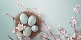 Easter floral composition on nest with pastel color decoration, Easter eggs decoration, eggs in the nest with copy space.